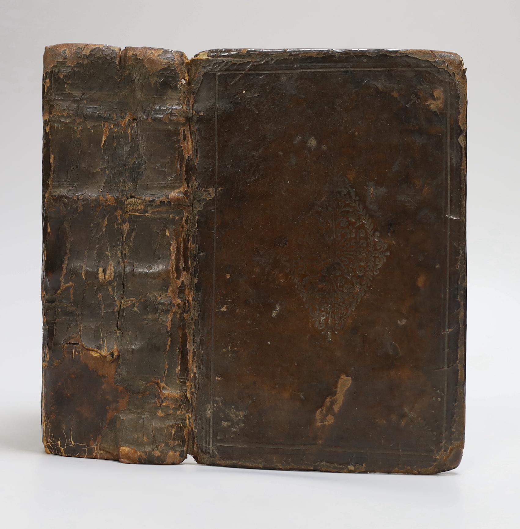 Geneva Bible [English]. - The Holy Bible, 8vo, contemporary calf, covers with lozenge shaped blind stamped device, lacking title, commences at leaf 3, concludes at leaf 445, end papers renewed, London, 1565.